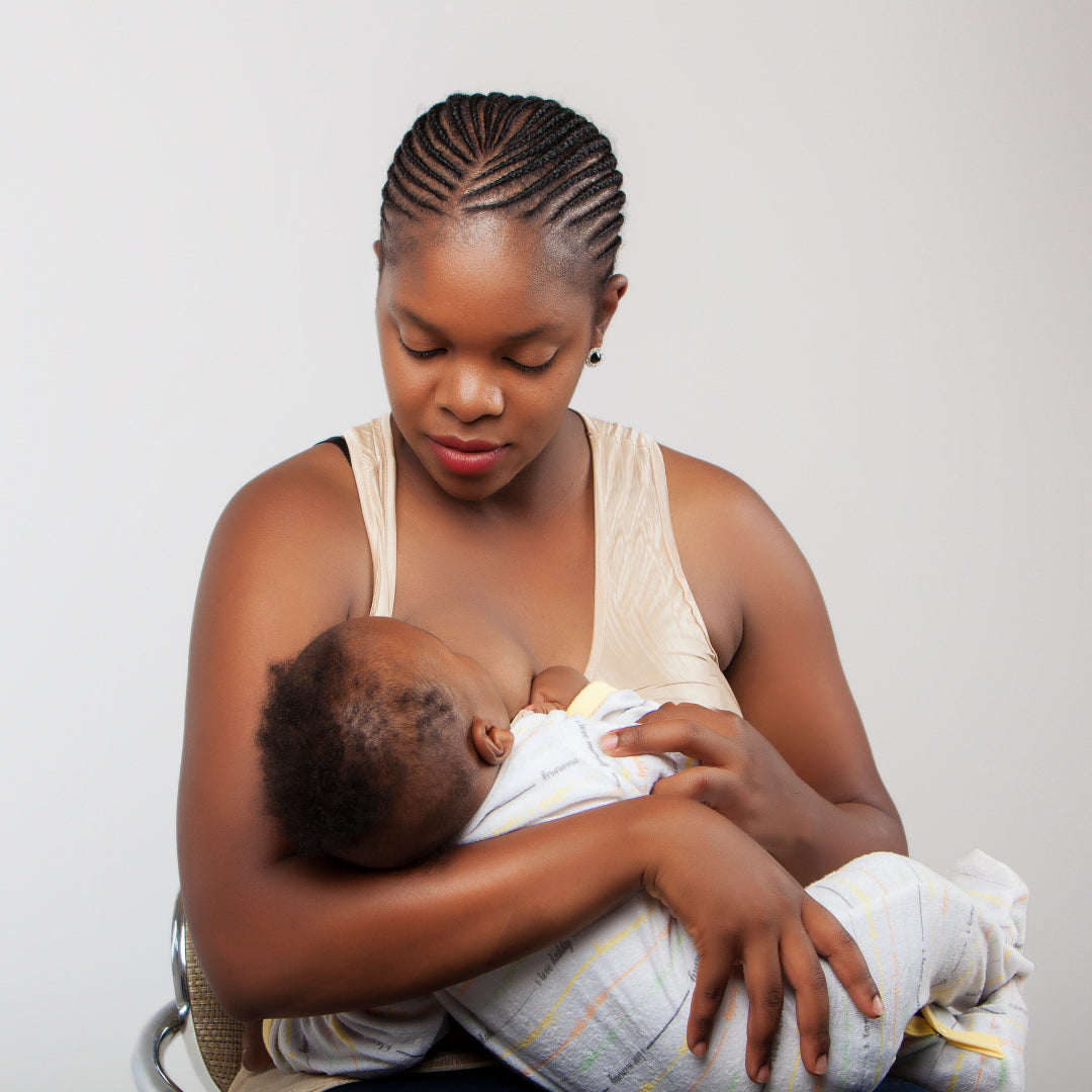 A mother breastfeeding her baby